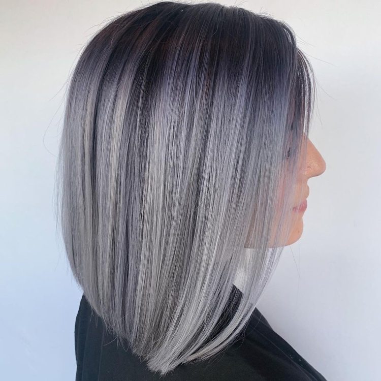 gray highlights in purple hair and long bob hairstyle