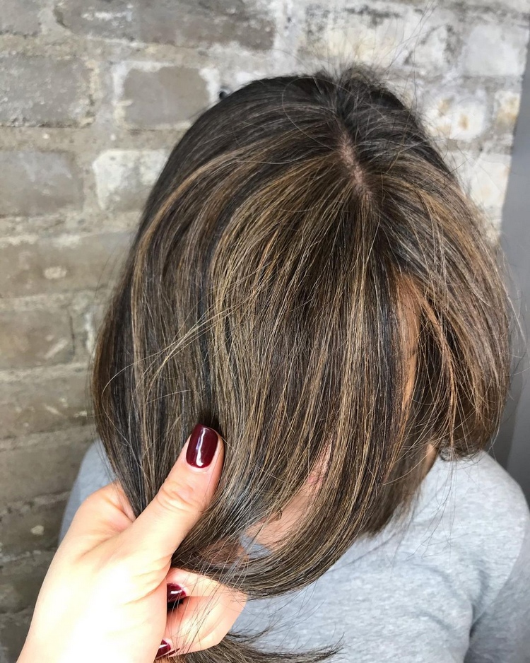 spice up gray hair with dark highlights