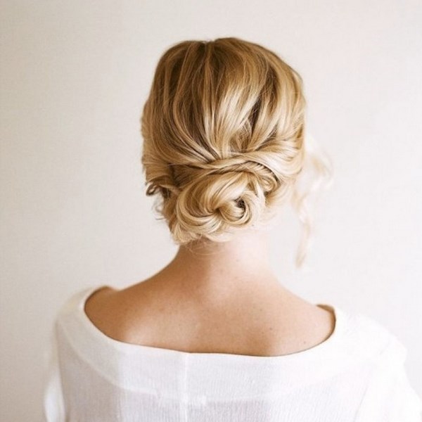 cute christmas hairstyles twisted messy blonde bun